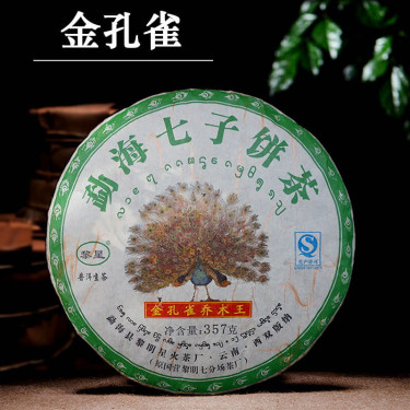 Прессованный блин Пуэра Шен «Яркий павлин» из провинции Юньнань
